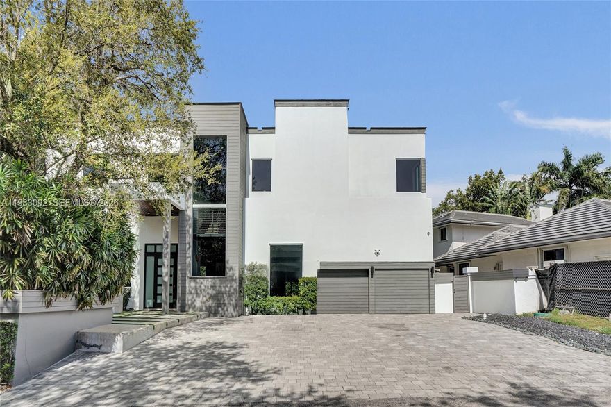 Fully rebuilt and meticulously renovated in 2017, this extraordinary 6BD/6.5BA estate in a prestigious gated North Miami Beach community offers the look, feel, and quality of new construction—truly a home that has it all. Designed for elevated modern living, with double-high ceilings throughout the house, 24*36 marble floors. Expansive light-filled interiors, and a spectacular chef’s kitchen with marble countertops, Sub-Zero appliances, gas range, and sleek custom cabinetry.
All 6 bedrooms feature en-suite baths, including a stunning primary suite with a private balcony overlooking a tranquil backyard oasis, plus a dedicated office. Thoughtfully designed for both comfort and entertaining, the home offers multiple living areas, upstairs and downstairs family rooms, maid’s quarters, laundry room, garage, and a whole-home water filtration system.
Step outside to your private resort-style retreat with a heated saltwater pool surrounded by lush, manicured landscaping—perfect for unforgettable gatherings or serene everyday living. Community amenities include playground, tennis & basketball courts and pavillon.
Ideally located just minutes from the beach, Aventura Mall, top-rated schools, and major highways. A rare opportunity to own a like-new luxury residence in one of North Miami’s most sought-after gated communities.