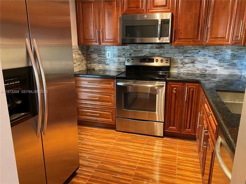 Photo of 706 Gardens Dr #101, Pompano Beach, FL 33069 (MLS # A11973204)