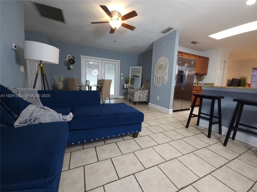 Photo of 382 NE Genesee Ave, Port St Lucie, FL 34983 (MLS # A11929157)