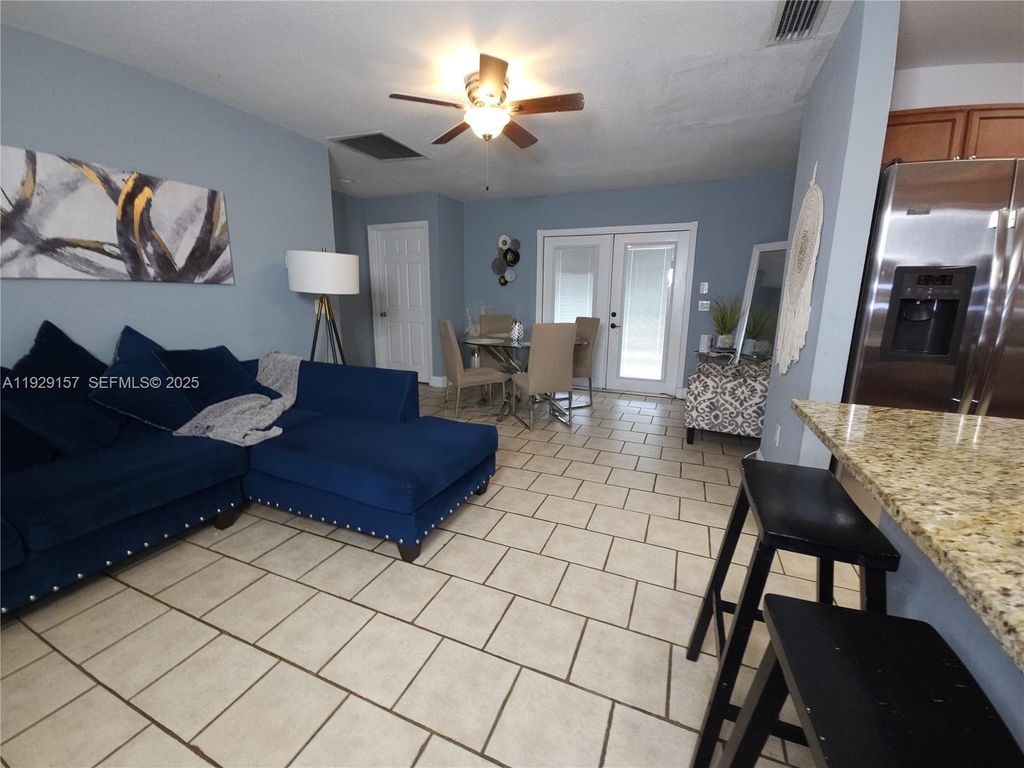 Photo of 382 NE Genesee Ave, Port St Lucie, FL 34983 (MLS # A11929157)
