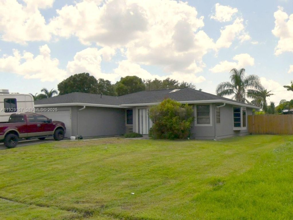 Photo of 382 NE Genesee Ave, Port St Lucie, FL 34983 (MLS # A11929157)