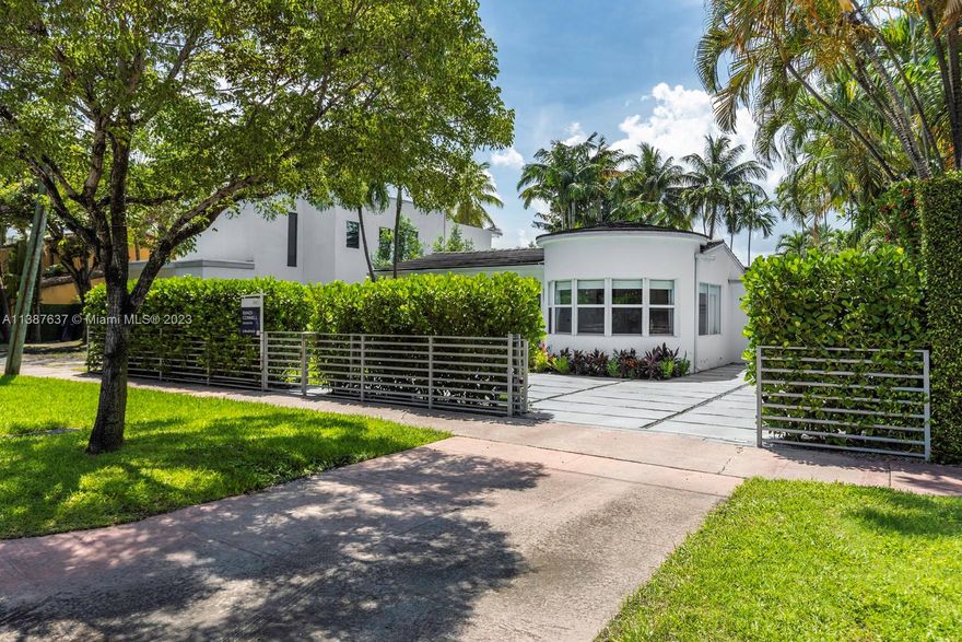 Welcome to your private oasis in the heart of Miami Beach! This beautifully designed and meticulously updated 4-bedroom, 4 1/2-bathroom house is a true gem. 1 car garage and plenty of additional parking space. Step inside this gated home and be greeted by an atmosphere that seamlessly blends luxury and comfort. The spacious kitchen features modern appliances and enjoy the beautiful lush backyard and pool views that flood the space with natural light. The backyard is a lush private oasis, perfect for relaxation and entertainment with meticulously manicured landscaping. Conveniently situated across from the Miami Beach golf course offering spectacular views, with close proximity to the vibrant energy that Miami Beach has to offer, beaches, restaurants, shopping, and exciting nightlife.