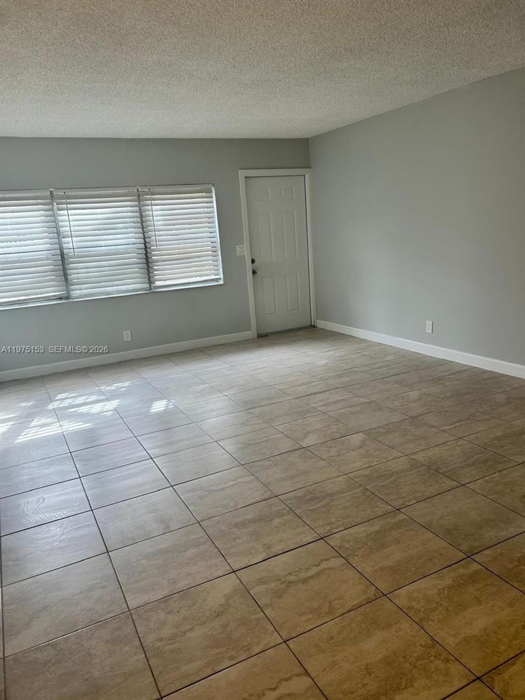 Photo of 802 Twin Lakes Dr #17-A, Coral Springs, FL 33071 (MLS # A11975153)