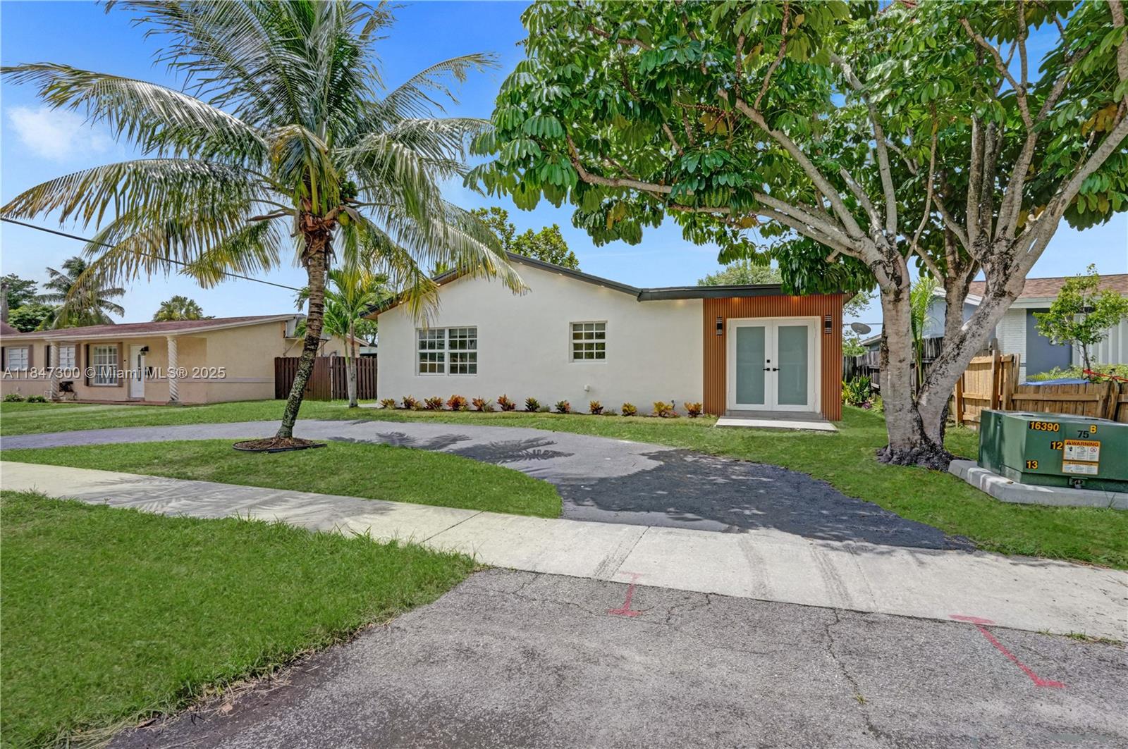 Welcome to this fully renovated 3-bedroom, 2-bathroom home in Sunrise offering 1,200 sq ft under air. This move-in-ready residence features a modern open-concept layout with an upgraded kitchen, quartz countertops, and stainless steel appliances. Both bathrooms have been stylishly remodeled with contemporary finishes. Enjoy vinyl flooring, fresh interior and exterior paint, and abundant natural light throughout. Brand new AC and water heater installed. Impact windows in place! The large backyard is perfect for entertaining, relaxing, or adding a pool. Conveniently located near parks, schools, shopping, and major highways. No HOA. A must-see!