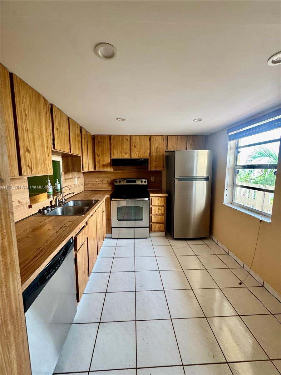 Photo of 401 SE 3rd St #405, Dania Beach, FL 33004 (MLS # A11832764)