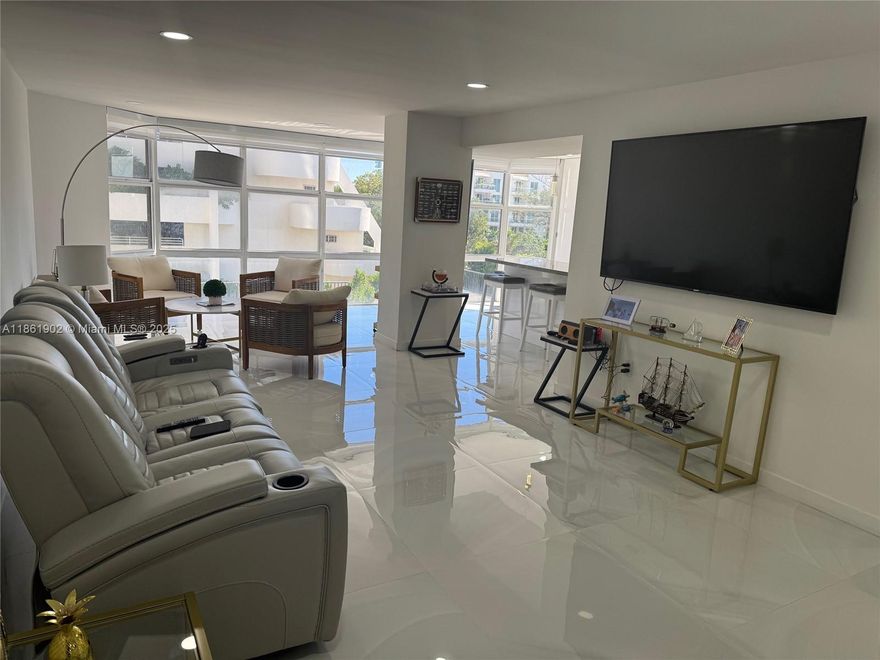 Fully renovated one bedroom plus den apartment  converted into 2 bedrooms located  in prime oceanfront location on Millionaire Road Miami Beach.Open concept unit with many upgrades. There are lost of lights throughout the unit.Wraparound balcony. Very easy to show.