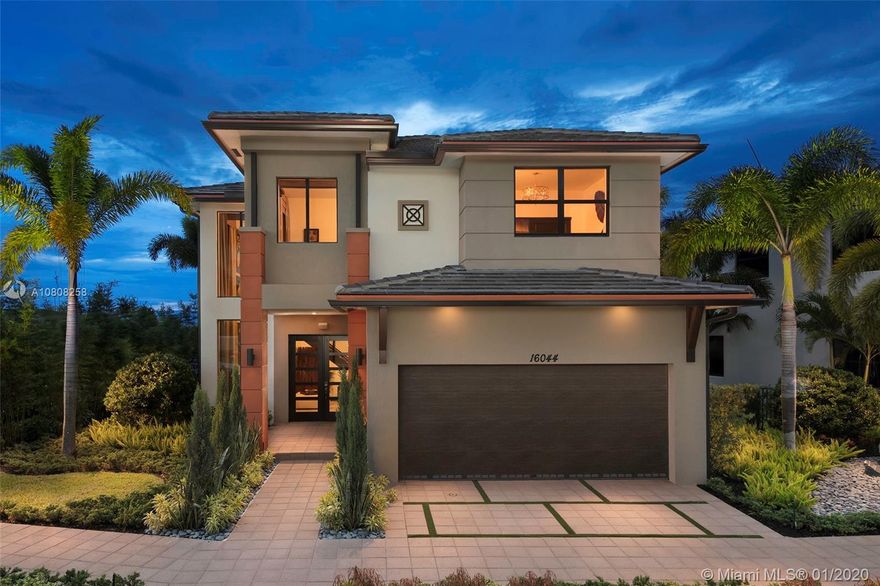 Beautiful corner location very private, upgraded features, impact windows, porcelain tile thru out first floor.