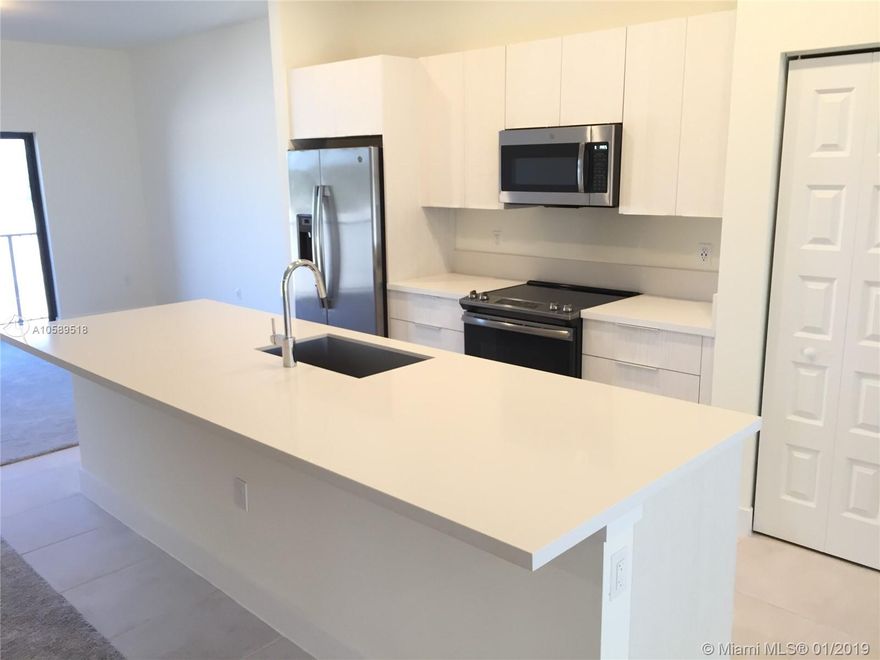 $1000 off first month with full price offers! Brand new and modern, 2 bedroom/2 bathroom + Den. Located on the 2nd floor with Elevator. Open layout, bright and spacious. Den can be used as dining room, studio/guest etc! Smart Technology: voice-controlled Amazon Alexa Automation System, Video entrance ring system, and more! Beautiful Kitchen w/Quartz Counter Tops, SS Appliances, and plenty of storage space. Master Bedroom w/Walking Closet, master bath with clear glass shower and beautiful stone flooring. New blinds will be installed. Washer and Dryer. Gated community. Amazing Clubhouse w/Fitness Center, Sauna, Swimming Pool, Kids Splash Zone, BBQ, Basketball, Tennis, Soccer Field and more. Excellent location. Close to Top rated schools, Dining, shopping malls, Miami Airport and highways.