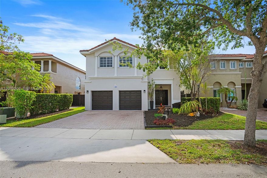 Discover lakefront living in the gated Venezia Lakes community in Miami! This immaculately updated 4-bedroom, 2.5-bath home features a dramatic entryway with sky high ceilings, stunning updated light fixtures & floors, a modern expanded kitchen, and renovated bathrooms. Enjoy seamless indoor-outdoor living with a private pool, floating dock, and direct lake access- perfect for boating and motorized watercraft! The spacious primary suite is an incredible retreat; the room is oversized with a large bathroom suite, stunning lake view & a large private balcony overlooking the pool and serene lake. Take in breathtaking sunset views each evening from your own backyard oasis. A rare opportunity to own a move-in-ready waterfront retreat in a secure, sought-after neighborhood. Call today for more!
