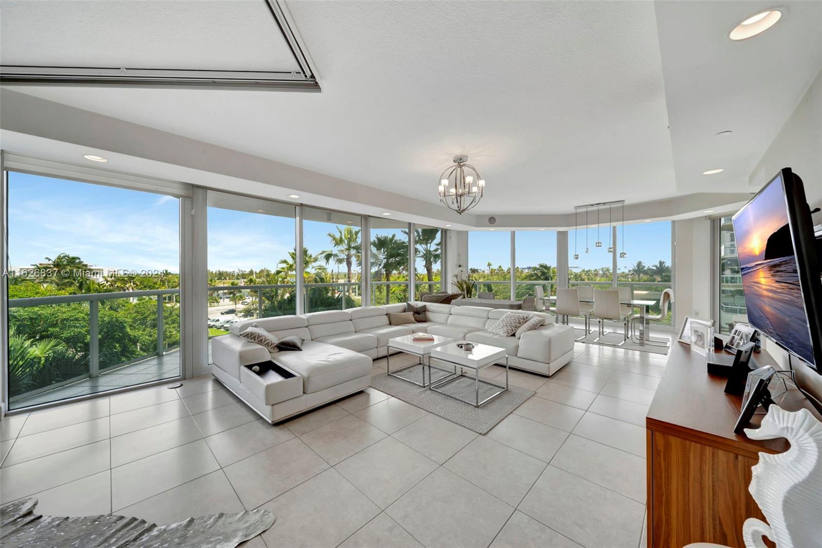 Nestled on the fourth floor of the exclusive Renaissance on The Ocean residence, this luxurious 2-bed+Den, 3-bath oceanfront condo epitomizes coastal living at it's finest. Boasting an expansive 2025 sq ft of meticulously crafted living space with a symphony of elegance and comfort. As you step inside, you are greeted by a seamless blend of contemporary design and breathtaking ocean views. Floor-to-ceiling windows bathe the interiors in natural light, creating a serene atmosphere that complements the rhythmic sounds of the ocean waves. The private balcony, overlooking the Atlantic, invites moments of tranquility, while the condo's location ensures an elevated perspective of the stunning surroundings. This oceanfront gem redefines luxury living in Hollywood Beach's most sought-after locale.