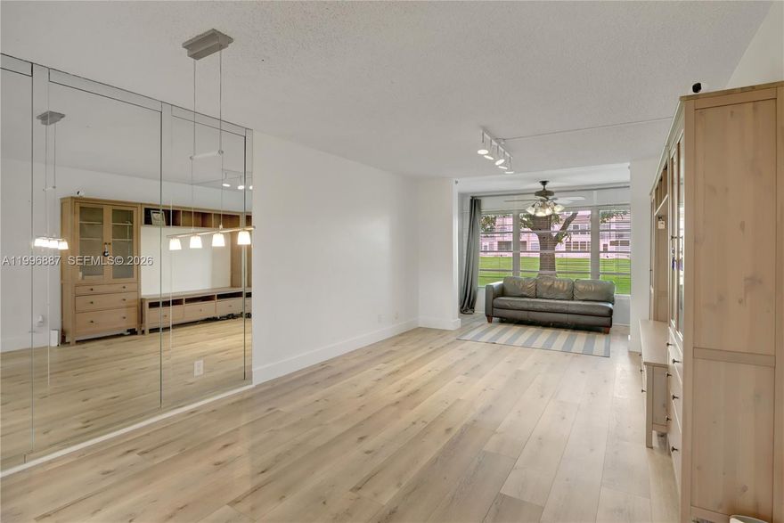 THIS CONDO IS READY FOR YOU! Gorgeous unit on the ground floor. This is an interior corner unit featuring newer wood kitchen cabinets. Storage on 3rd floor and Laundry room on 1st floor. Sunrise Lakes is a 55+ golf community with plenty of activities and near great shopping, restaurants and only 15 minutes from the beach. This unit has an appliances repair contract included in the maintenance payment. New A/C 2021. Qualified buyers will have a 670+ credit score and a Net income of $2400 or better per month. Don't miss out on this great deal! NO SPECIAL ASSESTMENT. Water, cable, internet, garbage, insurance also included in the maintenance. Hurricane Shutters!