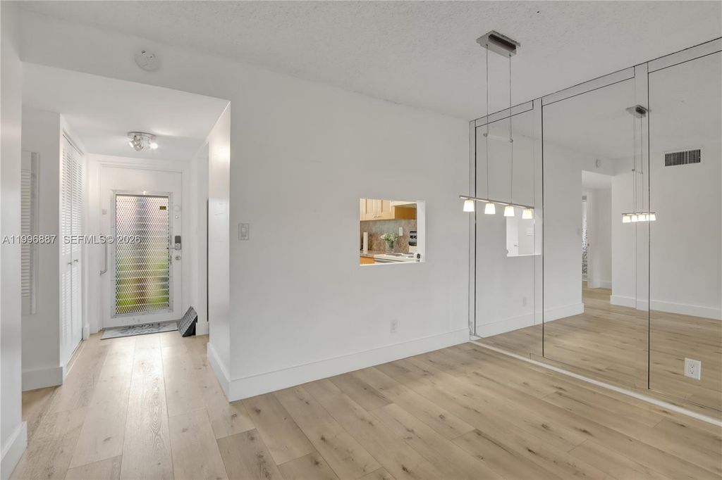Photo of 9041 Sunrise Lakes Blvd #106, Sunrise, FL 33322 (MLS # A11996887)