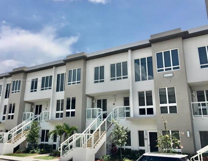 Beautiful and modern 3 bedrooms and 3 baths Condo in Landmark at Doral. NO Carpet! 1 car garage plus guest parking, 1 bedroom and 1 full bath in 1st level with social area integrated living room with family/dining room, and Master Suite and 1 bedroom with 1 full bath each in 2nd level. Many upgrades including white cabinets, quartz countertops, wine cooler and stainless steel appliances. The community offer State of Art Clubhouse and luxury living and amenities. A+ rated schools, and just minutes from Banks, Restaurants, Dolphin and International Mall, and Expressway.