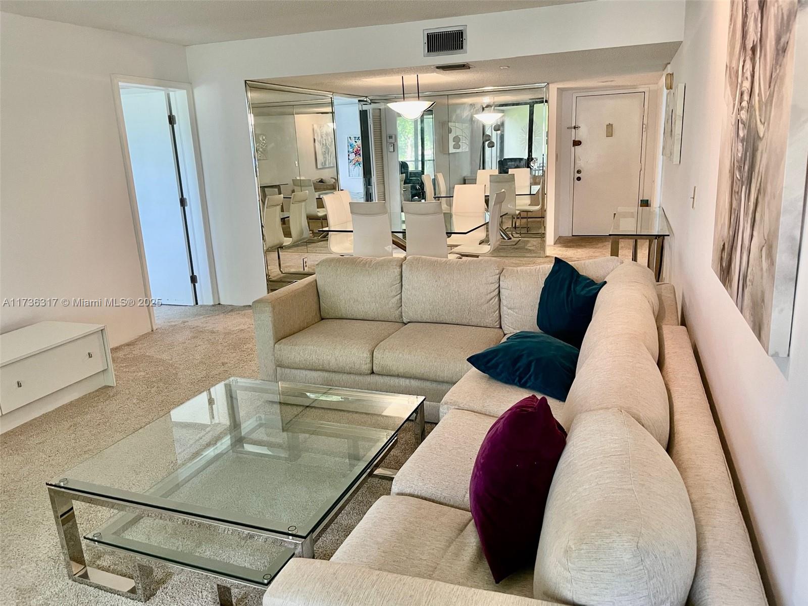 Country Club Village - This FURNISHED 2 Bed / 2.5 Bath Condo has a secured lobby entrance. This rarely available end unit features a kitchen window which allows more light into the unit, a split bedroom plan which offers both privacy & convenience. There is an eat-in kitchen with a laundry room with full size washer and dryer. The tiled balcony includes glass sliding doors which add additional square footage & space. Amenities include Pool and Tennis Courts and you can also enjoy all the amenities at the Bonaventure's Town Center Club, including Gym, Tennis Courts, Indoor Basketball Courts, 4 Lane Bowling Alley, Two Indoor Racquetball courts, Roller Skating Rink, a Toddler Bounce House, Card Rooms, Clubhouse, Theatre, 2 pools and much more!
