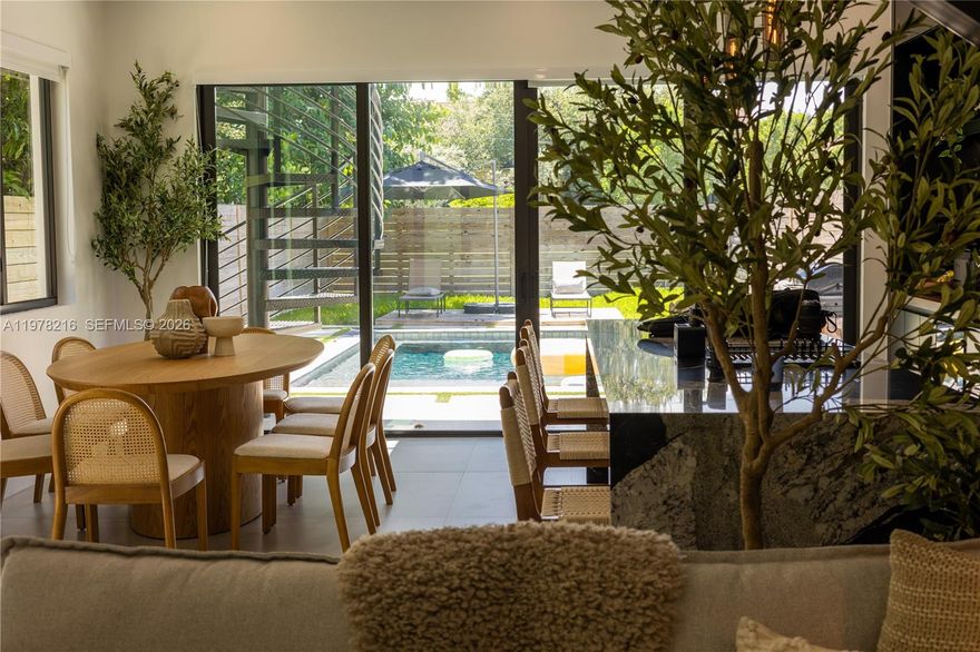 Experience modern elegance in this stunning 3-bedroom, 4-bath new construction townhouse in the Miami
Shores/Shorecrest area. Featuring a sleek contemporary kitchen with granite countertops and premium appliances,
this home offers high-impact windows and doors, a concrete roof, and a private pool for ultimate comfort. Take in
panoramic rooftop views and enjoy the convenience of being steps from military trail park, best schools, shopping,
dining, and easy access to the Miami Shores Country Club and vibrant Biscayne Blvd. Interior designer decorated,
WI-FI extenders throughout, full blackouts in all bedrooms, and high efficiency appliances are just a few details
that make this home a rare find in the trendy upper east side