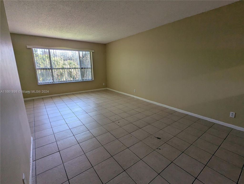 Photo of 10115 Twin Lakes Dr #24-M, Coral Springs, FL 33071 (MLS # A11661898)