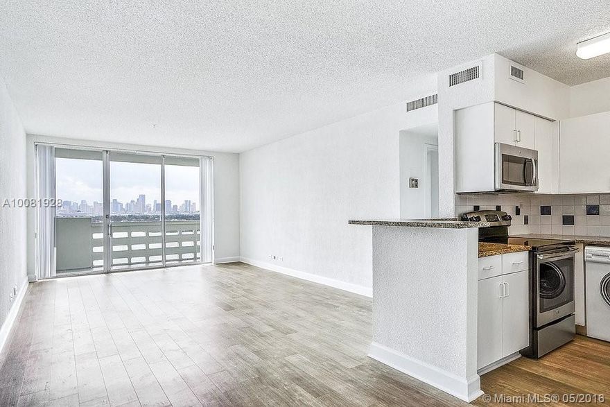 Welcome to Miami Beach's most exciting residential community, Flamingo South Beach. This 2 bedroom apartment has direct bay and Downtown Miami views. The interior features wood floors throughout, modern kitchen and baths with Stainless Steal appliances and granite counter tops. Community amenities include a fitness center, 2 resort style bay front pools surrounded by cabanas, lounge chairs and a tiki bar, a BBQ area and beach volleyball. Move-in for just 1 month + $1,500 deposit. Parking $150/month extra