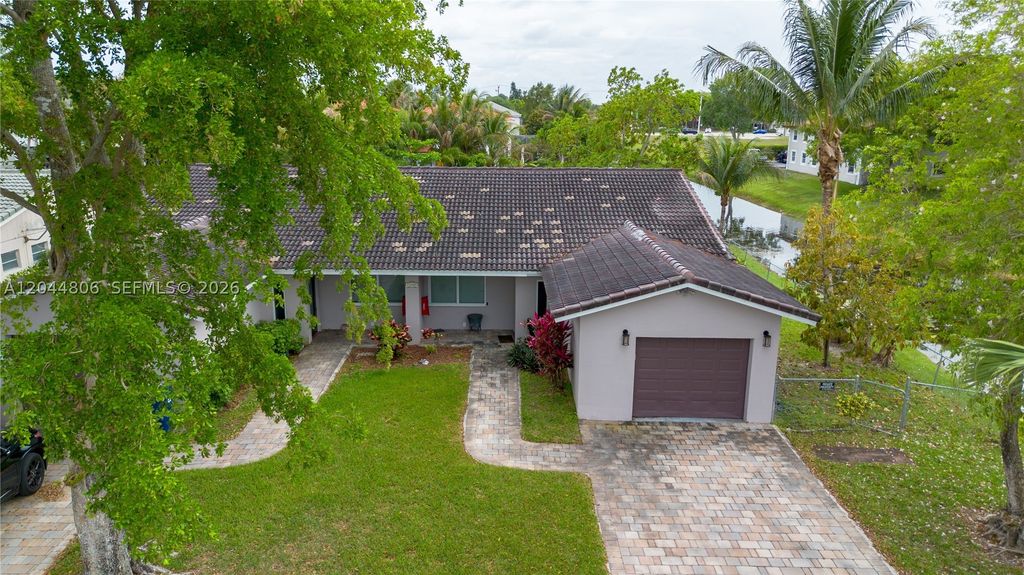 Photo of 11320 NW 35th Ct #B, Coral Springs, FL 33065 (MLS # A12044806)