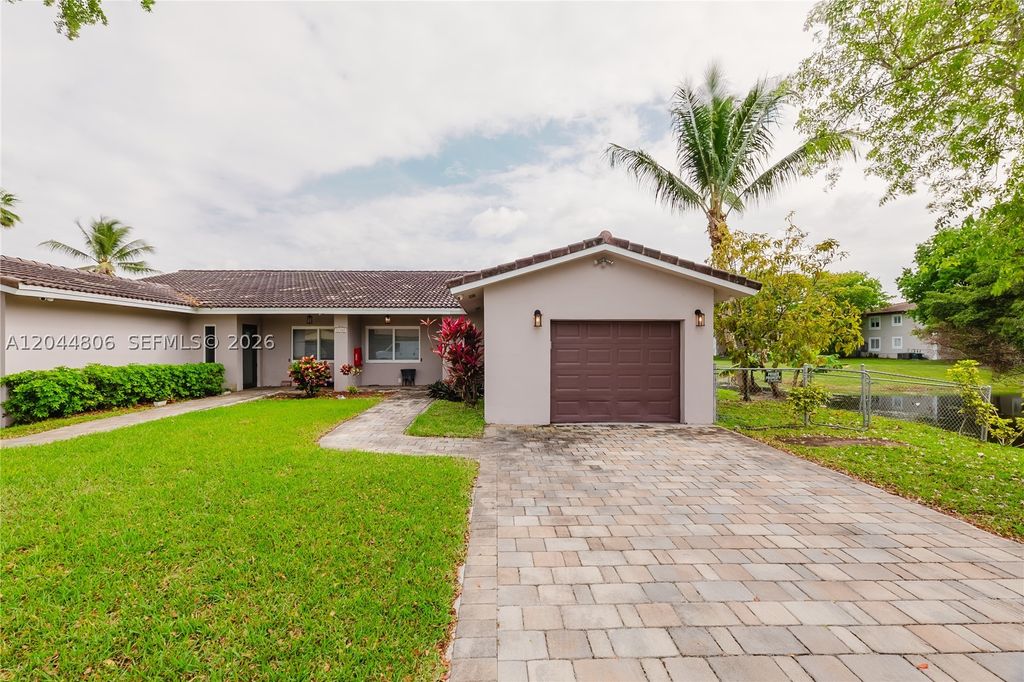 Photo of 11320 NW 35th Ct #B, Coral Springs, FL 33065 (MLS # A12044806)