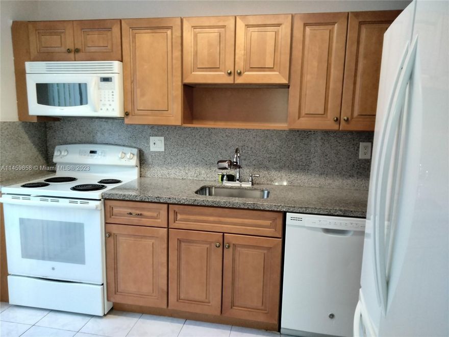 Beautiful Lafe Front, first-floor unit. Kitchen open to the living area, split floor plan, master bedroom overviewing the lake, spacious two bedrooms two full bath unit all tile through. Property is also for rent. Easy to show.
