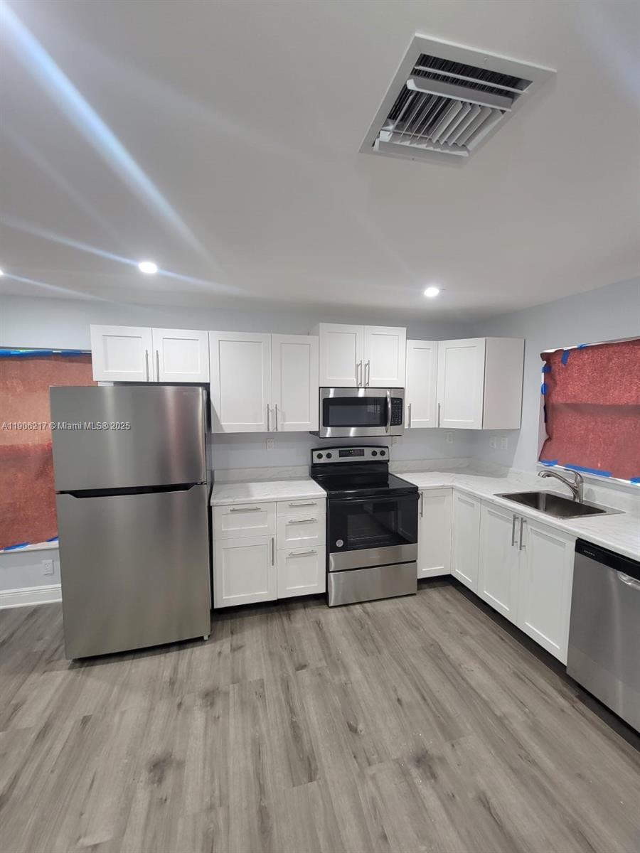 View photos, virtual tours, details... 1809 NW 8th Pl 1809