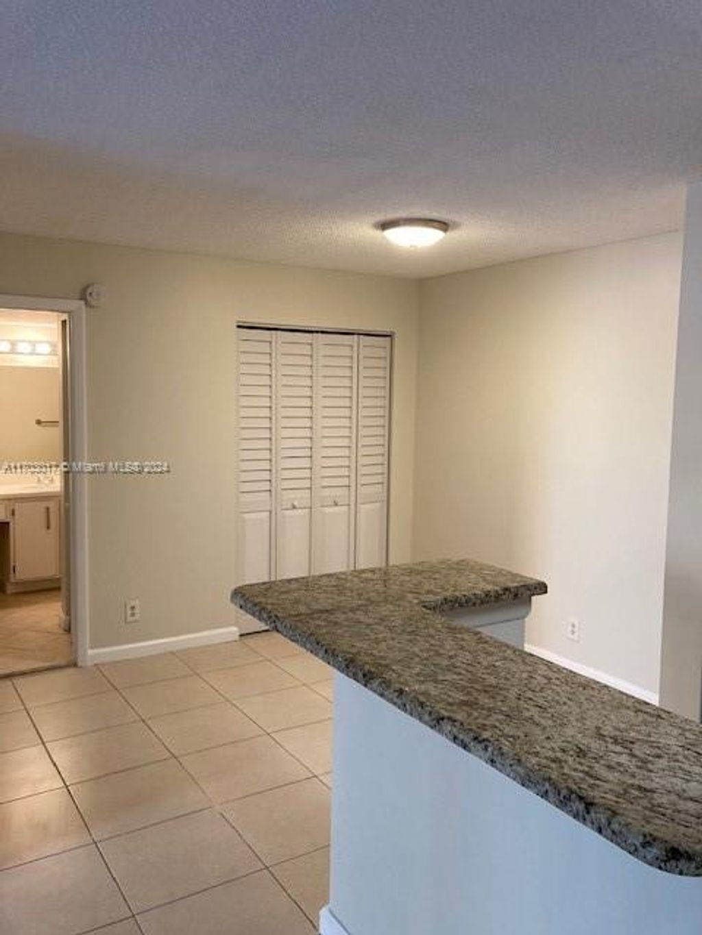 Photo of 10765 Cleary Blvd #103, Plantation, FL 33324 (MLS # A11703017)