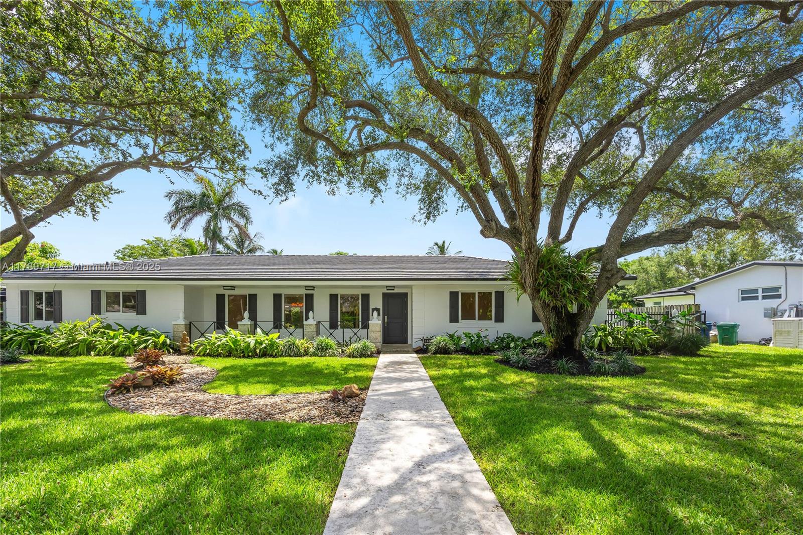 Enjoy the South Florida lifestyle in this beautifully remodeled canal-front home in North Palmetto Bay. Set on a 15,000 sq. ft. with lush landscaping, fruit trees, and wide side yards, it features an open layout, custom kitchen with gas range and high-end appliances, two en-suite bedrooms, impact windows and doors, and a spacious patio with outdoor TV and chimney—perfect for entertaining.
Enjoy boating, paddleboarding, or kayaking right from your backyard, with frequent manatee sightings and native birds.
Recent updates include a new en-suite bath, refreshed primary suite, refinished marble floors, updated cabinetry, and fresh paint.
Near Coral Reef Park and top schools, water access, natural beauty, and small-town charm in The City of Parks. Rent includes lawn and pool care.