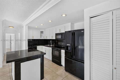 Photo of 4544 NW 79th Ave #1H, Doral, FL 33166 (MLS # A12061290)