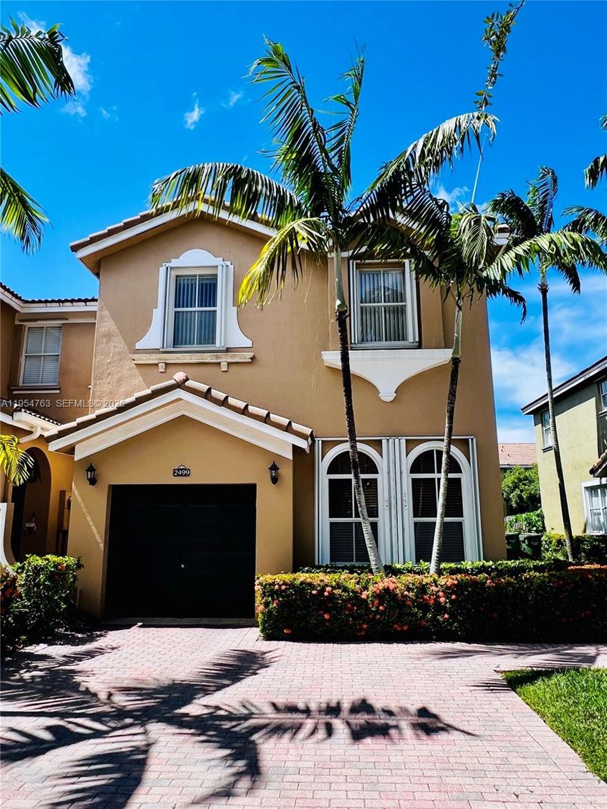 Beautiful corner townhouse in mint condition that lives like a single-family home. Features one bedroom and a full bathroom on the first floor. Spacious primary bathroom with jacuzzi. Enjoy a private patio with mango, papaya, and avocado trees. New washer and dryer. A/C approximately 2 years old