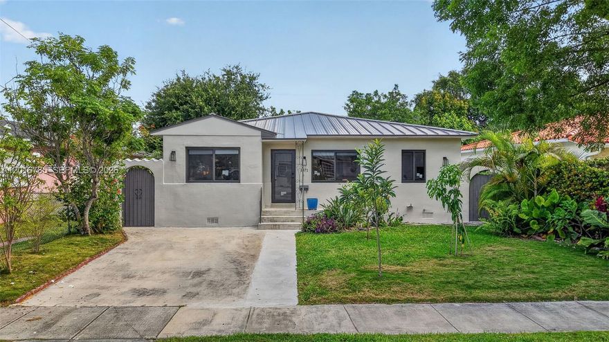 Nestled on a quiet, tree-lined street in Miami’s highly desirable Silver Bluff neighborhood, this move-in ready single-family home offers an exceptional combination of location, comfort, upgrades, and future potential.

The home has been thoughtfully updated with major improvements already in place, including a metal roof installed in 2023 and impact windows and doors installed in 2026, offering peace of mind and long-term value. Inside, the kitchen features high-end appliances, including a Thermador dishwasher, Samsung induction stove/oven, and Grohe kitchen sink and faucet, all installed in 2025.

The private, fenced outdoor space is a true highlight, featuring a spacious covered patio ideal for entertaining, relaxing, and outdoor dining. Beyond the patio, the generous garden is supported by a 70-foot clear water irrigation well and offers more than enough room to add a pool, creating an incredible opportunity to design your own private outdoor retreat.

From world-class dining and shopping to entertainment, parks, marinas, and various other attractions, the best of Miami is just minutes away while still enjoying the charm and calm of a residential neighborhood street.

With its prime location, valuable upgrades, flexible outdoor space, and move-in ready condition, this Silver Bluff home is a rare opportunity to own a well-located Miami property with both immediate appeal and long-term potential.
Photos Coming Soon.