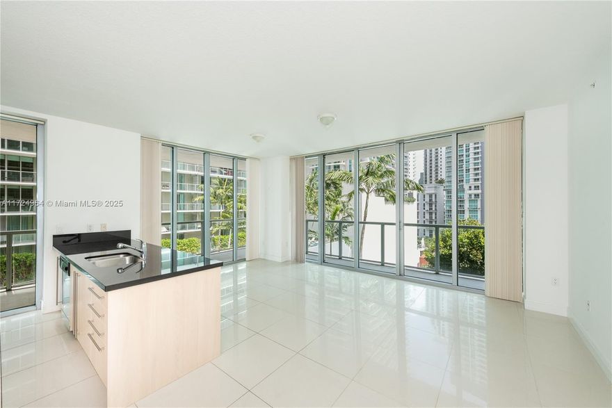 Welcome to your dream home at Axis Brickell! This beautifully designed 2-bed, 2-bath corner apartment is flooded with natural light, creating a warm and inviting atmosphere. With its smart split-floor plan, this residence offers both privacy and spaciousness, making it perfect for comfortable living or entertaining guests.
- Bright and Airy: Enjoy floor-to-ceiling windows that showcase breathtaking views and fill your home with sunshine throughout the day.
- Modern Living: Classic finishes and open layout provide a stylish backdrop for your personal touch.
- Prime Location: Situated in the vibrant Brickell neighborhood, you are just steps away from world-class dining, shopping, and entertainment options. 
Own a piece of paradise in one of Miami's most sought after location!