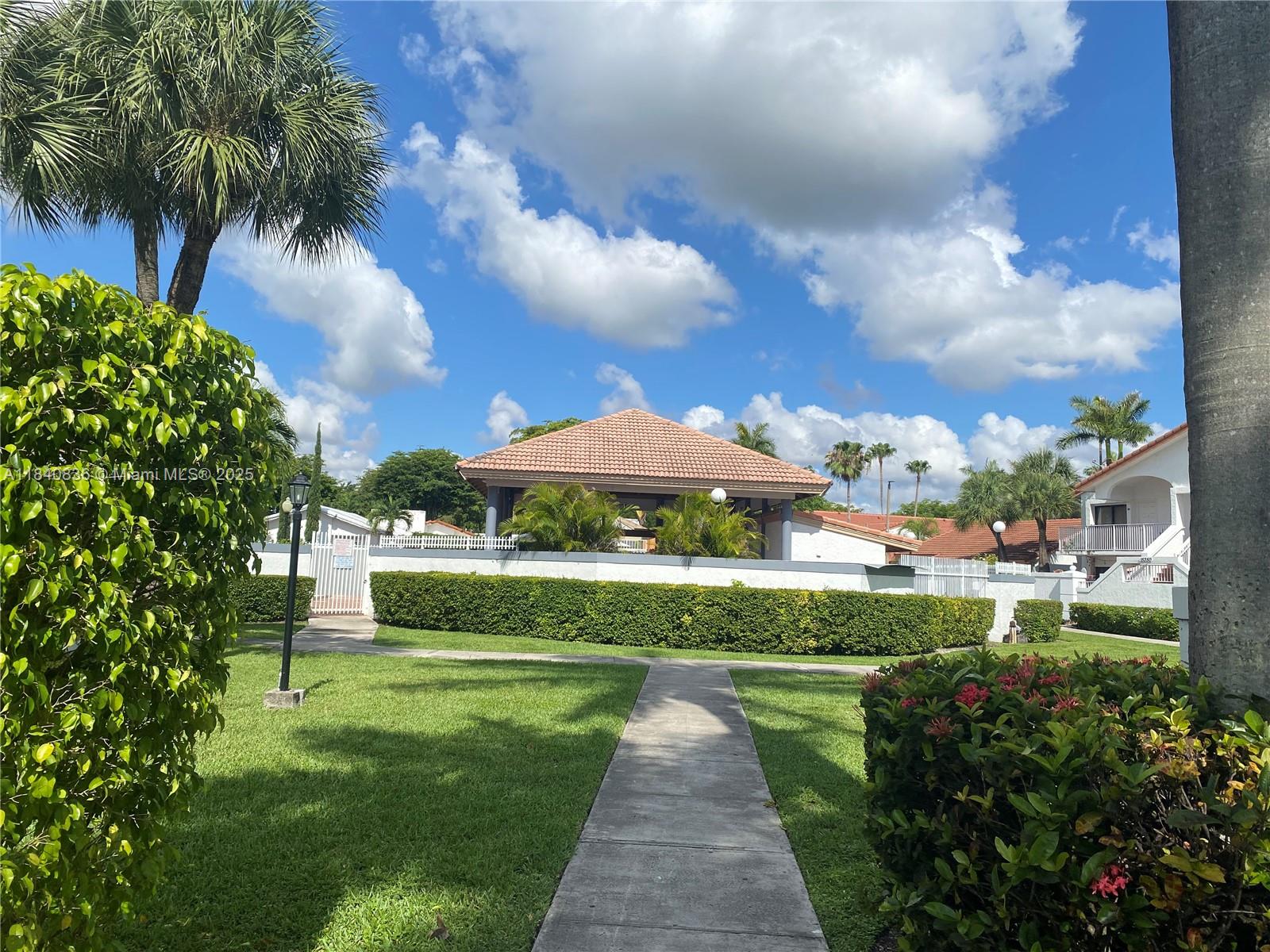 Beautiful condominium, high ceilings with pool views. Modern home with upgraded kitchen: glossy ceiling-height cabinets, LG counter-depth fridge, GE quiet dishwasher, glass cooktop, and ceiling-mounted hood. Includes Frigidaire washer/dryer, Goodman AC with UV light, tankless water heater, Nest thermostat, Ring doorbell, and Yale smart lock. Smart features: Ethernet, 4 security cameras, home theater, and modern blinds. Both bath with bidet, Bluetooth light, fog free mirrors and glass shower. Master bedroom with walk in closet, and balcony with pool view. Includes assigned parking and guest parking available.