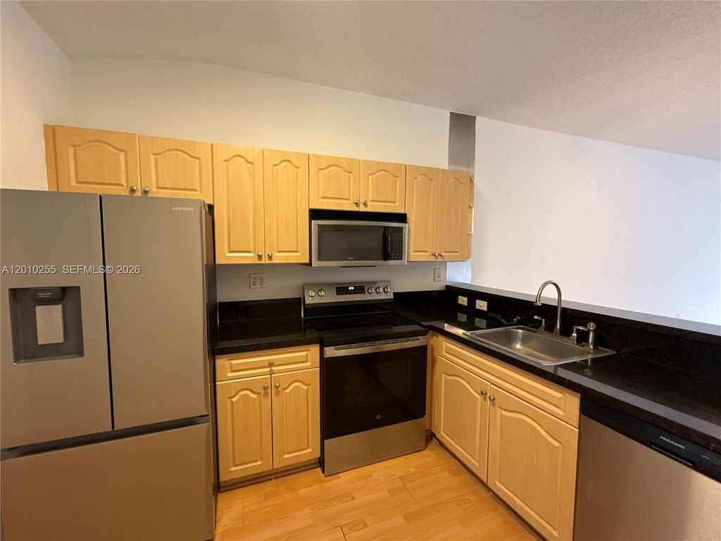 Photo of 9979 Nob Hill Ln #9979, Sunrise, FL 33351 (MLS # A12010255)