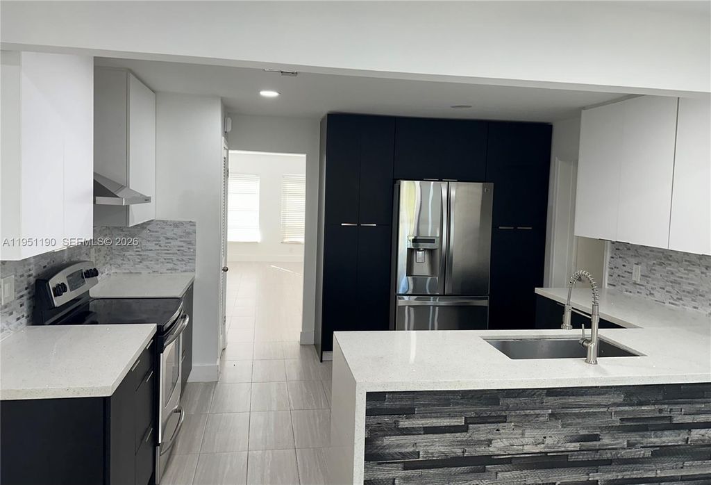 Photo of 3199 Coral Hills Dr #4, Coral Springs, FL 33065 (MLS # A11951190)