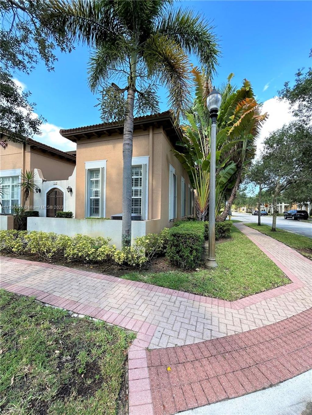 Photo of 1065 SW 147th Ter #1, Pembroke Pines, FL 33027 (MLS # A11390055)