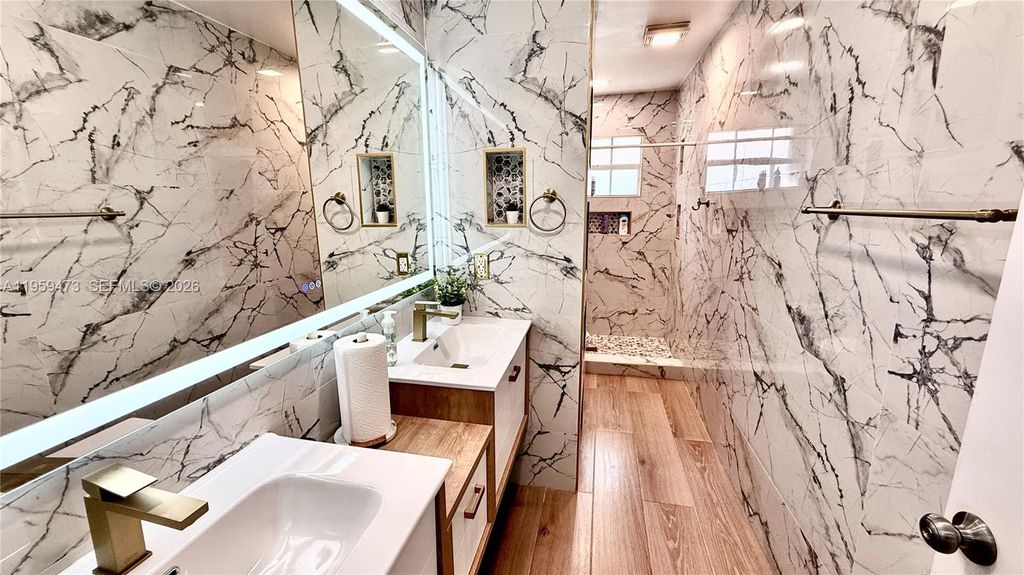 Photo of 5470 Pine Cir, Coral Springs, FL 33067 (MLS # A11959473)