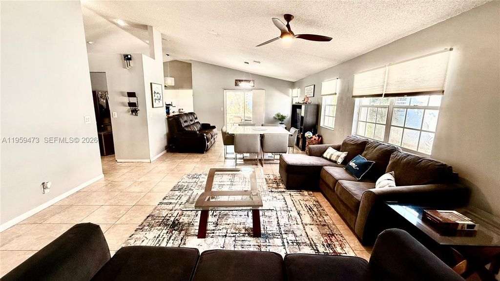 Photo of 5470 Pine Cir, Coral Springs, FL 33067 (MLS # A11959473)