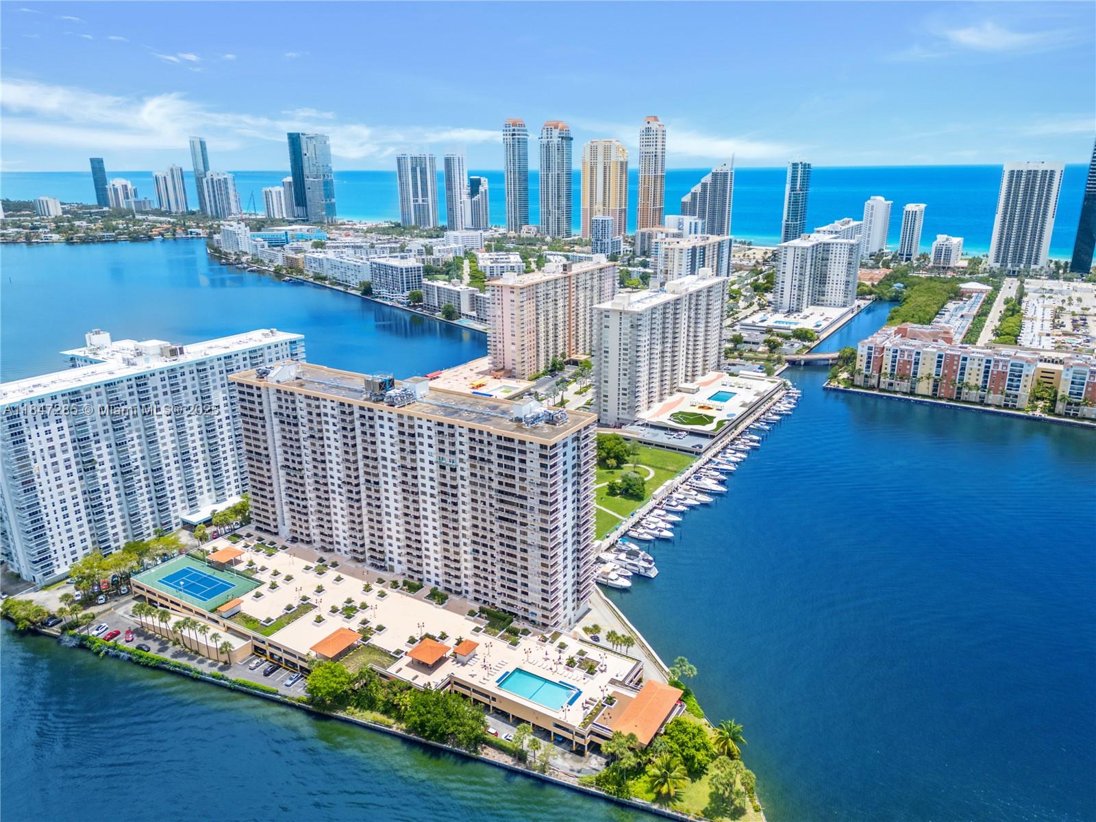 Stunning direct waterfront Condo with Exquisite views from a High 10th floor condo offering breathtaking, unobstructed views of the Atlantic Ocean from a prime location in Sunny Isles Beach, Located in a prestigious, full-service building, this residence combines comfort and resort-style living. Spacious layout with plenty of natural light, large Kitchen, master suit with generous size walk-in, and a private balcony. This unit is steps away from the sandy beaches, high end shopping (Aventura Mall and Bal Harbor Shops) Great A rated schools Norman S. Edelcup. Perfect for primary residence, vacation home, or rental investment in one of the most desirable coastal communities. Amenities include fitness center, sauna, game room, library, heated pool, tennis court, and 24-hour security