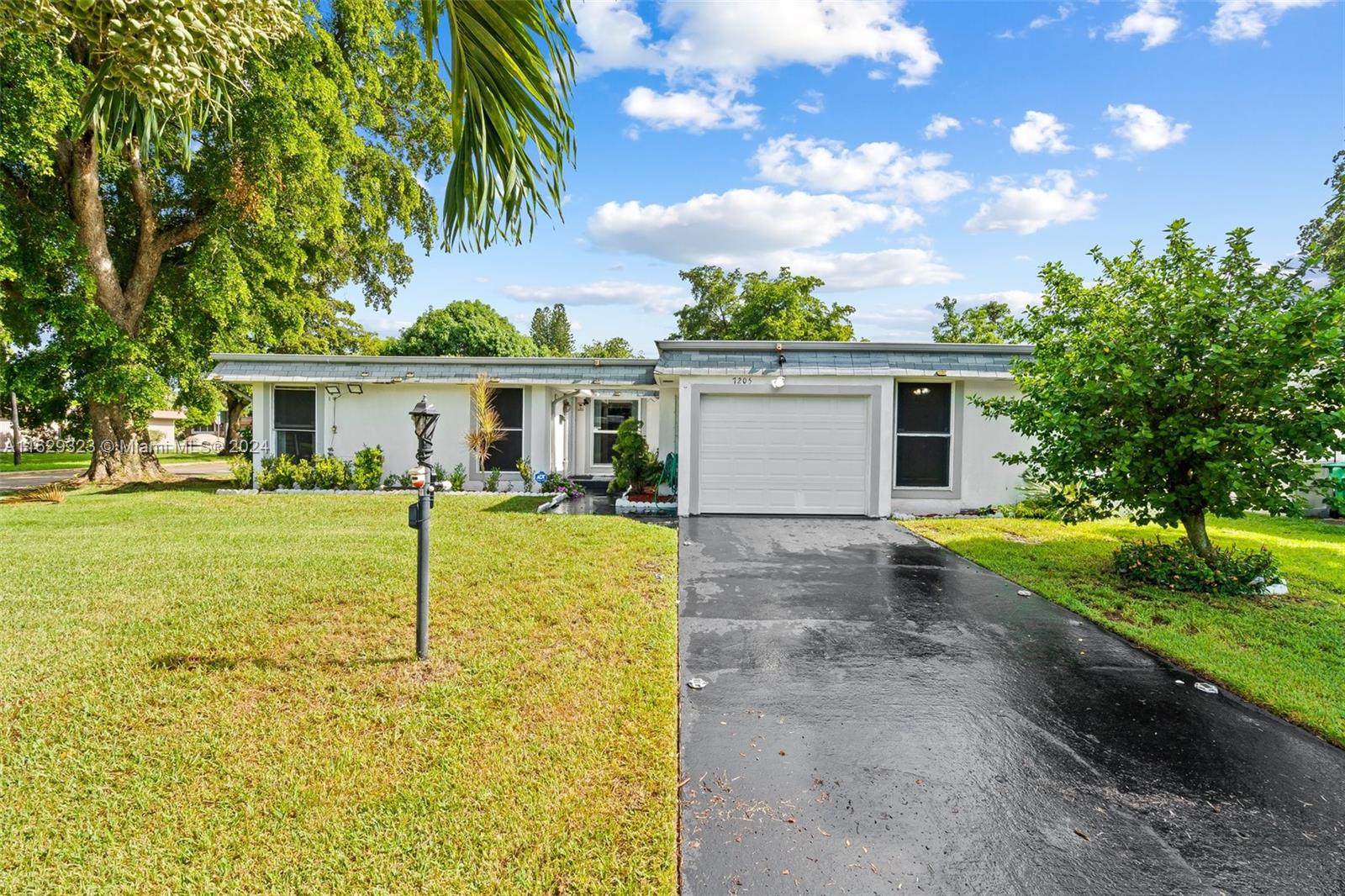 7205 Nw 67th St St, Tamarac, Broward County, Florida - 3 Bedrooms  
2 Bathrooms - 