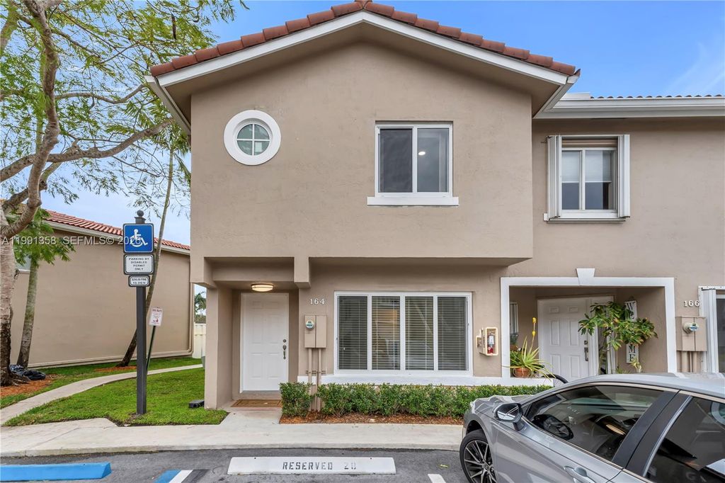 Photo of 164 Riviera Cir, Weston, FL 33326 (MLS # A11991358)