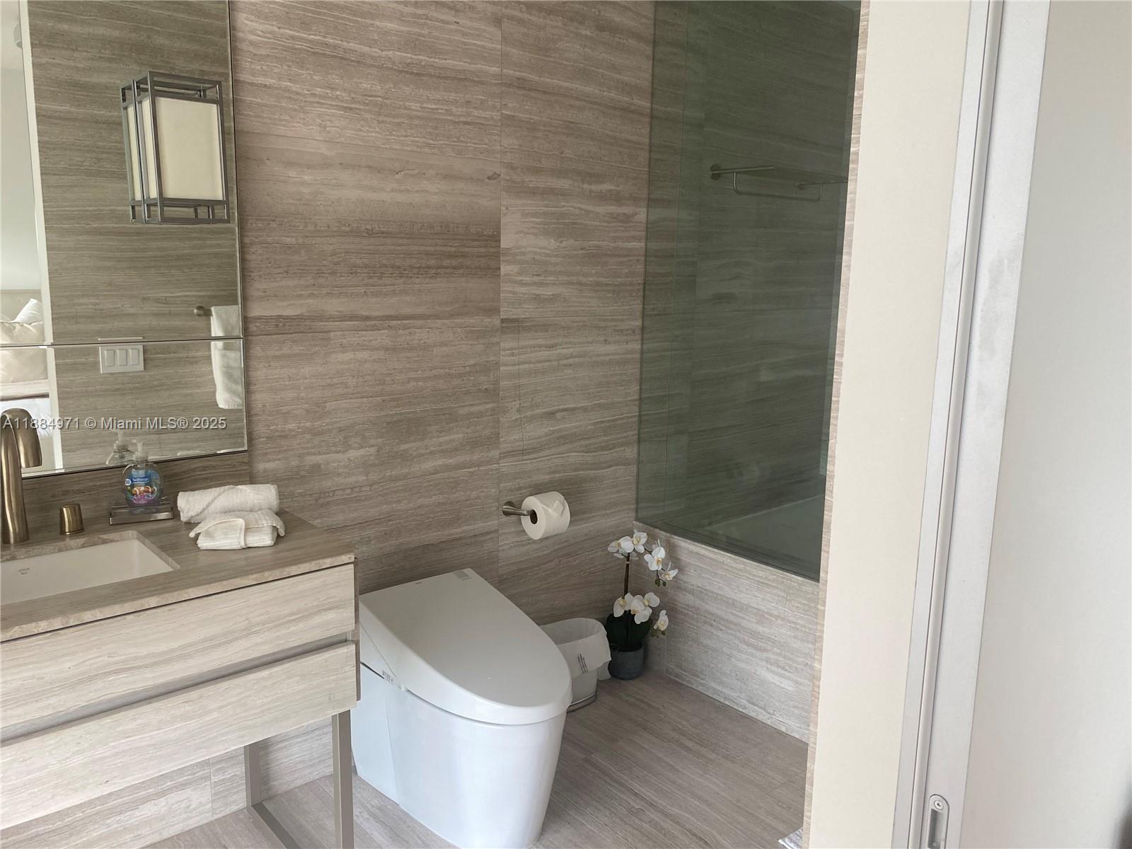 18975 COLLINS CONDO - Residential Lease