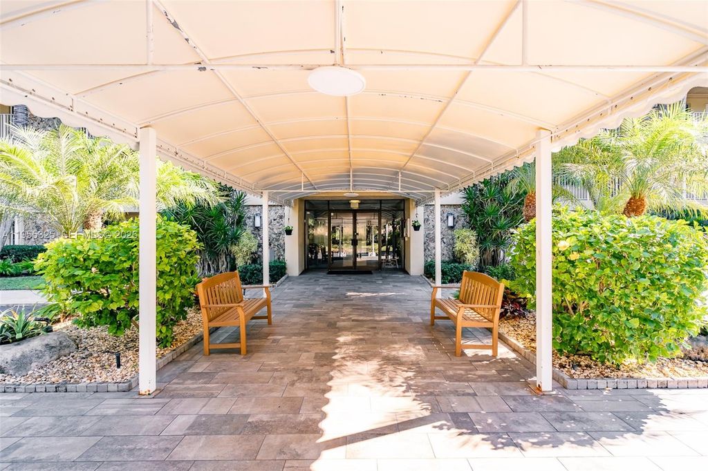 Photo of 804 Cypress Grove Ln #308, Pompano Beach, FL 33069 (MLS # A11955325)