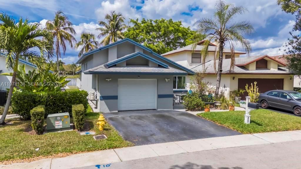 Photo of 529 Lakeside Cir, Sunrise, FL 33326 (MLS # A11978138)