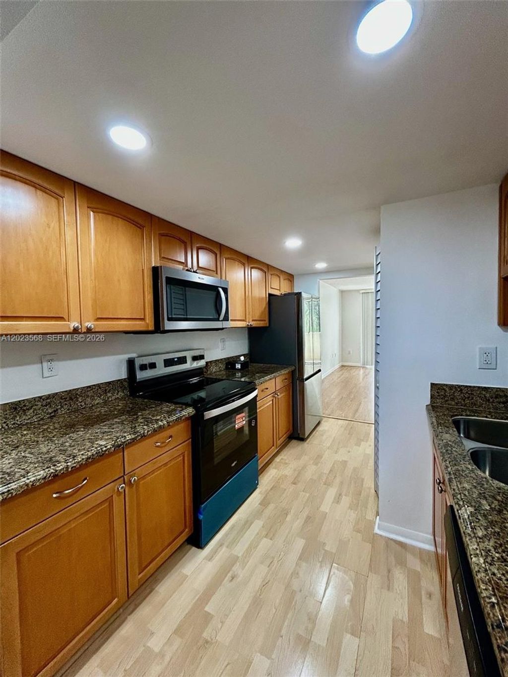 Photo of 7451 NW 16th St #304, Plantation, FL 33313 (MLS # A12023568)