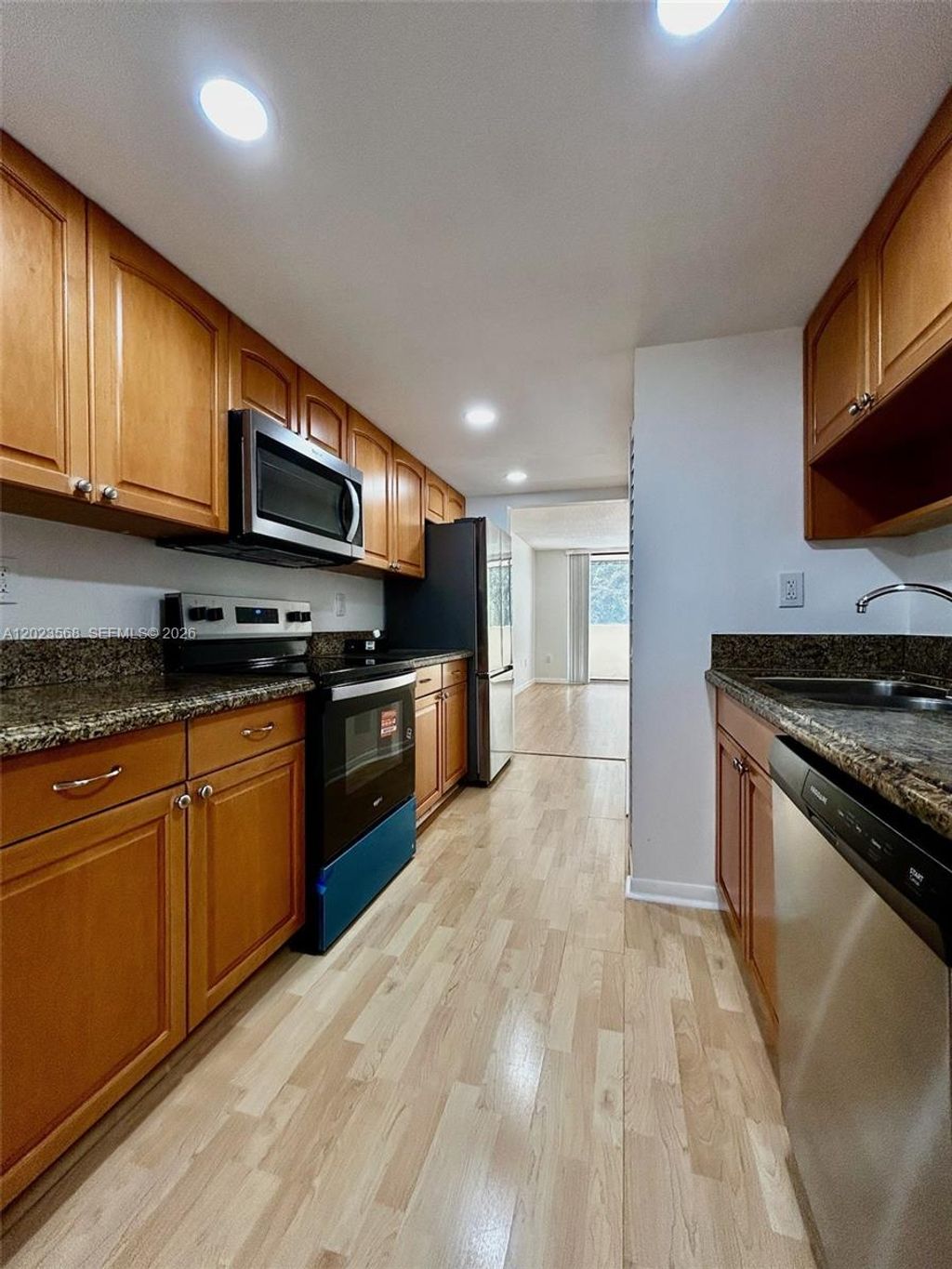 Photo of 7451 NW 16th St #304, Plantation, FL 33313 (MLS # A12023568)