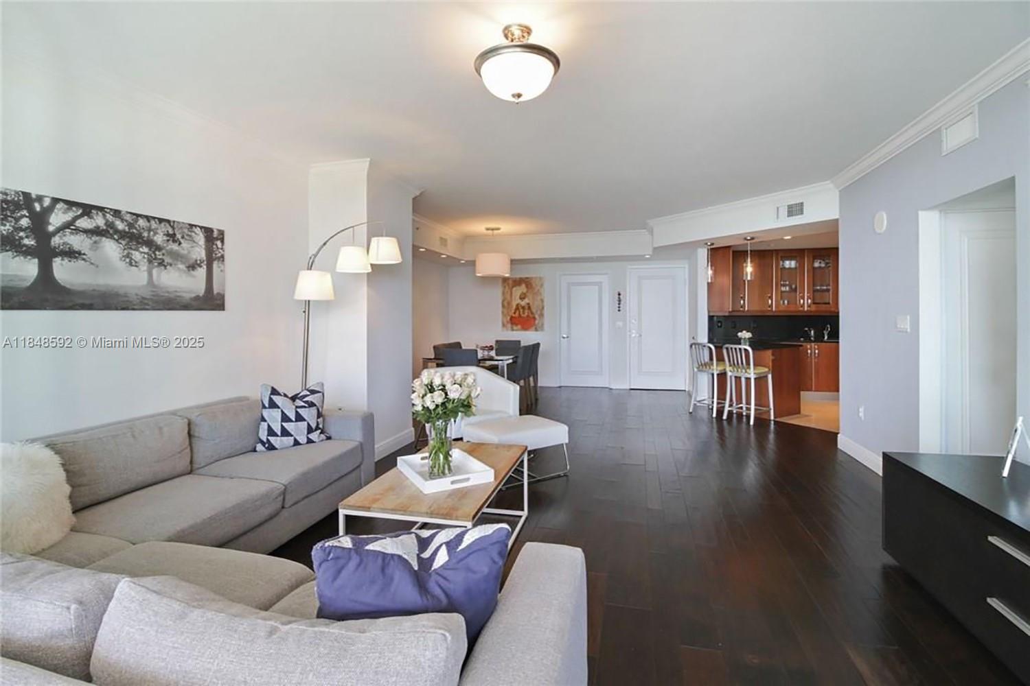 Move-in ready, fully renovated 2BR/2BA condo on the 18th floor of a premier high-rise. 1,425 sq.ft. of luxury with private elevator & foyer, gourmet kitchen featuring Monogram appliances & Italian cabinetry, primary suite with walk-in closet & spa-style bath with dual shower heads & body jets. Wood flooring throughout, tile in kitchen & baths. Professionally furnished with Crate & Barrel & Restoration Hardware pieces. Spacious balcony with breathtaking Intracoastal & ocean views. Full-service building with doorman, Shabbat elevator, pool, gym, massage room & EV chargers.