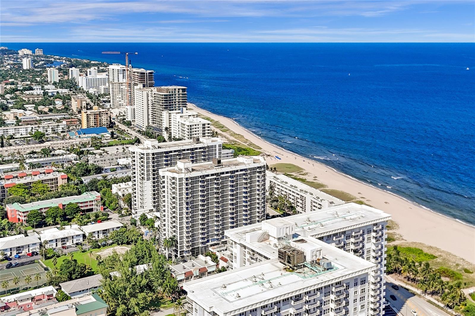 Beautiful 11th floor condo with direct Ocean view from the living room and both bedrooms through the floor to ceiling impact windows. South East exposure for plenty of sunlight. Watch the sunrises and sunsets from the balcony. Tile throughout the entire unit. This condo comes with 1 garage parking space but extras are almost always available. Bike storage room and extra storage area available. Resort style amenities include 24 hour concierge services, heated pool, 3 large grills out by the pool, tennis, pickleball, bocce ball court, gym, sauna, pool table, library. This building is in great financial shape so a qualified buyer my obtain financing with as little as 5% down. Private beach access and Walk to the newly built downtown Pompano beach area with shops, restaurants, and much more.