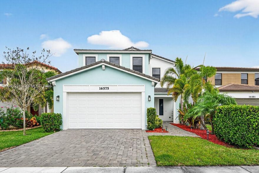 Gorgeous Modern 5-bedroom, 3.5 Bath, built in 2022 is placed in the new vibrant city of Westlake, Florida. This popular Sand Dollar 5 Floor plan includes a guest suite on the first floor ideal for home office or the in-laws. A Chefs dream kitchen with oversized island, quartz countertops, upgraded gas stove, Lots of cabinets and pantry space. This sleek home boasts high gloss 24x24 Porcelain tiles throughout the home. A spacious loft upstairs makes a great theater room or play area. The primary bedroom features a large walk-in closet with a custom closet system. Tankless Gas water heater, Hurricane impact-resistant windows and doors throughout, ceiling fans in every room, fenced in backyard, covered patio with extended pavers ideal for an outdoor kitchen. Come see YOUR Dream Home Today!!