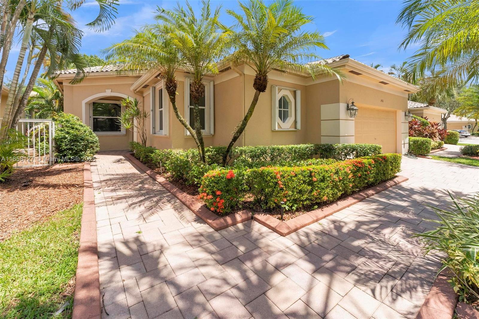 Beautiful Home in Highly desirable Bay Isle Neighborhood of Weston Hills Country Club Golf Community! This stunning property offers 3 spacious bedrooms plus an office or 4th Bedroom. Double Glass Entry doors. Stunning Golf course Views.Fully remodeled Kitchen, Marble floors, Crown Molding and Plantation Shutters. Large Master Suite overlooking golf course! Large custom walk in closets. Gourmet Kitchen, Top of the line Stainless Steel Appliances. Wine Cooler, Granite countertop. Large Screened patio. Surrounded by top rated A+ schools