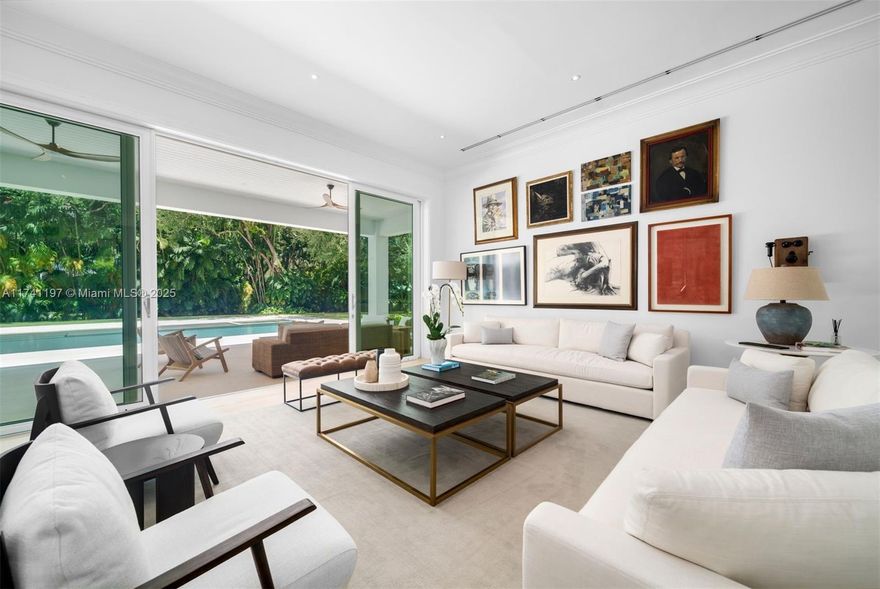 Luxurious 8,284 Sq. ft. custom-designed contemporary home on 1.28 acres of lush tropical landscaping, with 6 BD, 6 BA and 2 half BA in the desirable Snapper Creek gated community off Old Cutler Road, with its full-service marina and direct access to Biscayne Bay. Highlights include an office, gym, and chef’s kitchen with top-of-the-line appliances and custom cabinetry. The home seamlessly blends indoor and outdoor spaces, with sliding doors opening to a resort-style pool with cabana bath and covered terrace. The main suite boasts a spa-like bath with dual vanities, soaking tub, and large frameless shower that connects to a unique outdoor shower surrounded by landscape that provides privacy. Designed with family comfort in mind, the home offers a perfect blend of elegance and tranquility.